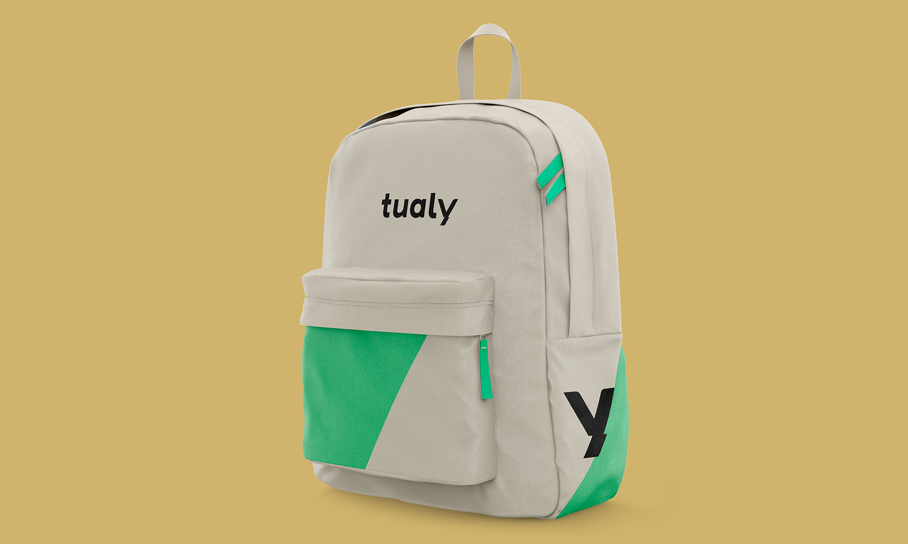Tualy backpack — beige canvas with green diagonal panel and oversized 'y' mark on side