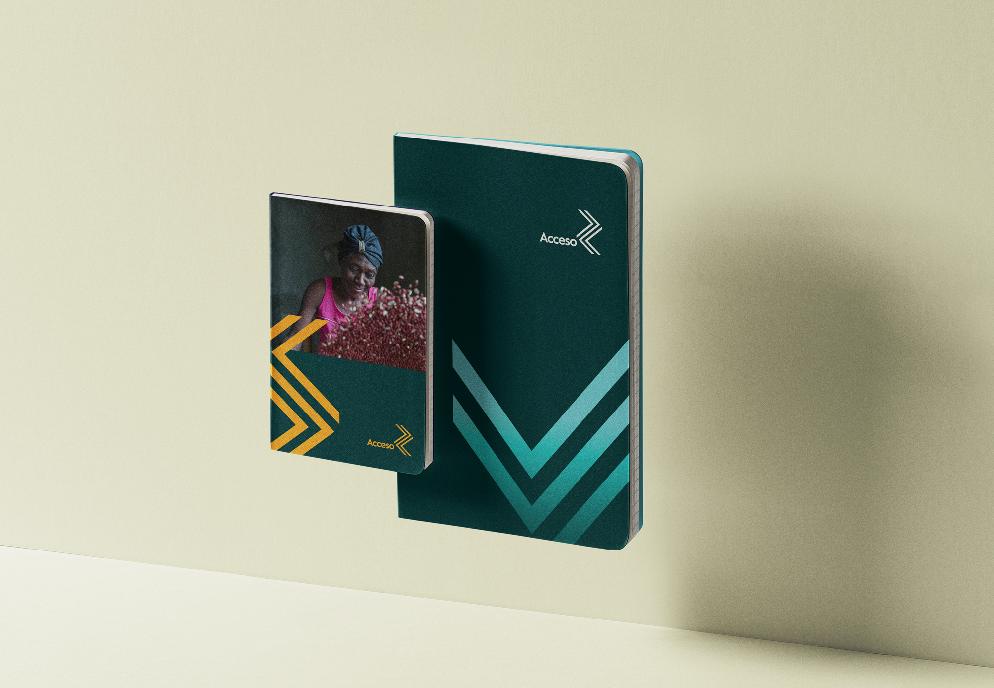 Acceso notebooks — forest green with teal chevron, and photo cover with amber chevron
